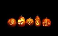 halloween five carved pumpkins jack o lanterns lights glowing holiday desktop background