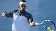 feliciano lopez returns the ball 1920x1080