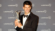 nole with laureus sportsman of the year award 2011